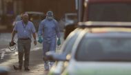 Forensic investigators work the scene in the Finsbury Park area of north London after a vehicle hit pedestrians, on June 19, 2017. AFP / Daniel LEAL-OLIVAS