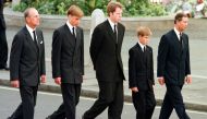 This file photo taken on September 06, 1997 shows (L to R) Britain's Prince Philip, Duke of Edinburgh, Prince William, Earl Spencer, Prince Harry and Britain's Prince Charles, Prince of Wales walk outside Westminster Abbey during the funeral service for D