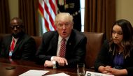 U.S. President Donald Trump talks to the media during his meeting with immigration crime victims at the White House in Washington, U.S., June 28, 2017. REUTERS/Yuri Gripas
