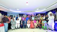 Officers and members of PMG Doha with local singers and musicians during the Eid Al Fitr party organised by PMG Doha. 