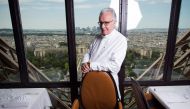 Star-studded French Chef Alain Ducasse posing in his restaurant 