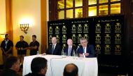 Jason Greenblatt (centre), US President Donald Trump's Middle East envoy, sits next to Tzachi Hanegbi (left), Israeli Minister of Regional Cooperation and Mazen Ghoneim, head of the Palestinian Water Authority, at a conference in Jerusalem, yesterday.