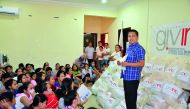 Overseas Filipino Workers waiting to receive kits from INCQ at OWWA office. 