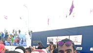 Qatari beach volleyball players Ahmed Tijan and Julio Cesar celebrate with officials after they became runners up of the FIVB Beach Volleyball World Tour Agadir Tournament in Morocco.