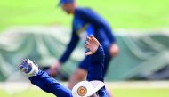 Sri Lankan cricketer Kusal Mendis catches the ball during a practice session at Galle International Cricket Stadium in Galle on Monday ahead of the first Test against India which begins today.