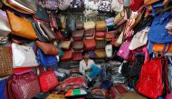 A vendor arranges bags as he waits for customers at his shop at a market in Mumbai, India, January 6, 2017 (REUTERS / Danish Siddiqui) 