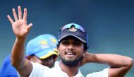 This file photo taken on July 18, 2017 shows Sri Lankan cricket captain Dinesh Chandimal during the one-off Test against  and Zimbabwe in Colombo.