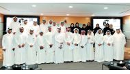 Amaal bint Abdullatif Al Mannai, CEO, Qatar Foundation for Social Work (QFSW), with media persons and volunteers, after the honouring ceremony at the Ali bin Hamad Al Attiyah Arena in Doha yesterday. Pic: Salim Matramkot/ The Peninsula