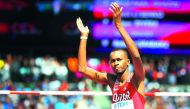 Mutaz Essa Barshim of Qatar reacts after qualifying for the final round of the men’s high jump competition at the IAAF World Championships in London yesterday. The gravity defying Qatari star breezed through yesterday’s qualification, clearing the automat