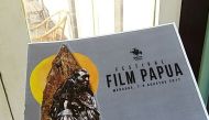 This Twiitter picture shows someone holding festival booklet 