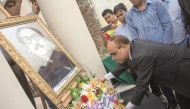 The Ambassador of Bangladesh, Ashud Ahmed, along with officials placing floral wreaths in front of the portrait of the Father of the Nation Bangabandhu Sheikh Mujibur Rahman, yesterday, at the embassy premise, yesterday. 