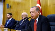 President of Turkey, Recep Tayyip Erdogan (R) holds a press conference prior to his official visit to Jordan before his departure with the presidential plane at Ataturk International Airport in Istanbul, Turkey on August 21, 2017. ( Kayhan Özer - Anadolu 