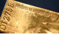 A gold bar is presented at the German Central Bank in Frankfurt am Main, central Germany on August 23, 2017. AFP / DPA / Arne Dedert
