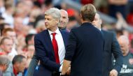 Arsenal manager Arsene Wenger shakes hands with Liverpool manager Juergen Klopp after the game REUTERS/Phil Noble 
