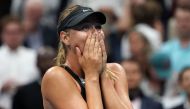Maria Sharapova of Russia celebrates her victory over Simona Halep of Romania during their Women's Singles match at the 2017 US Open Tennis Tournament August 28, 2017 in New York.  AFP / DON EMMERT
