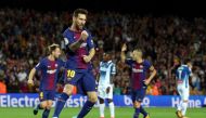 Barcelona’s Lionel Messi celebrates scoring their first goal. REUTERS/Albert Gea