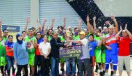 Doha Desert, winners of the PIBAQ Rising Division Championship pose for a picture with officials during the awards ceremony.