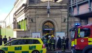 Emergency services attend the scene following a blast on an underground train at Parsons Green tube station in West London, Britain September 15, 2017, in this image taken from social media. TWITTER / @ASolopovas/via REUTERS