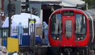 Forensic investigators search on the platform at Parsons Green tube station in London, Britain, September 15, 2017. REUTERS/Hannah McKa