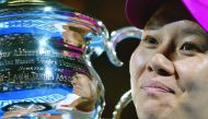 China’s Li Na poses with the trophy after her victory against Slovakia’s Dominika Cibulkova in Australian Open final in Melbourne, in this January 25, 2014 file photo.