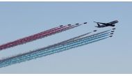 Qatar Airways Airbus A350 flying in formation with the British Royal Air Force’s (RAF) iconic Red Arrows