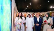 Celebrity Chef Zarmig Halladjian (left) and Katara General Manager Dr Khalid bin Ibrahim Al Sulaiti (second left) along with other guests at the opening of “Inspiration of the Fruit of Susie Tree” exhibition at Katara Building 19.