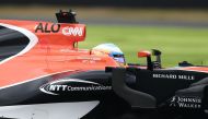 McLaren's Spanish driver Fernando Alonso drives during the third practice session of the Formula One Japanese Grand Prix at Suzuka on October 7, 2017. / AFP / BEHROUZ MEHRI
