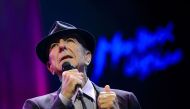 (FILES) This file photo taken on July 5, 2013 shows Canadian songwriter Leonard Cohen performing at the Auditorium Stravinski during the 47th Montreux Jazz Festival. AFP / FABRICE COFFRINI
