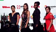 (From left) Garbine Muguruza of Spain, Karolina Pliskova of Czech Republic, Venus Williams of the United States and Jelena Ostapenko of Latvia pose for photographers during the Official Draw Ceremony of the WTA Finals Singapore on October 20, 2017. AFP / 