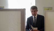 Czech billionaire Andrej Babis, chairman of the ANO movement (YES), walks to cast his ballot at a polling station during the first day of the Czech elections on October 20, 2017 in Pruhonice, Central Bohemia. AFP / MICHAL CIZEK
