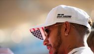Race winner Lewis Hamilton of Great Britain and Mercedes GP talks to the media after the United States Formula One Grand Prix at Circuit of The Americas on October 22, 2017 in Austin, Texas. Clive Mason/AFP
