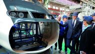 French Finance Minister Bruno Le Maire stands next to a high-speed train TGV as he visits the Alstom factory in Belfort, France, October 26, 2017. Reuters/Philippe Wojazer