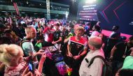 Riders interact with fans during the Qatari leg of the FIM Superbike World Championship 2016 at Losail International Circuit in this file photo.