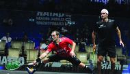 Gregory Gaultier (left) of France in action against Diego Elias of Peru during their Qatar Classic quarter-final match played at the Khalifa International Tennis and Squash Complex in Doha Yesterday. Gaultier eased into today’s semi-finals after beating t
