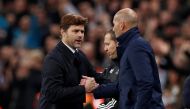 A file photo of Tottenham manager Mauricio Pochettino as he shakes hands with Real Madrid coach Zinedine Zidane after the match November 1, 2017. Action Images via Reuters/John Sibley
