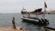 FILE PHOTO: A Libyan coast guard member conducts a daily routine check on one of the patrol boats in Tripoli, April 19, 2016. (Reuters / Ismail Zitouny) 