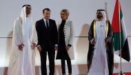 Abu Dhabi Crown Prince Sheikh Mohammed bin Zayed al-Nahyan, French President Emmanuel Macron, Brigitte Macron and Prime Minister and Vice-President of UAE and Ruler of Dubai Sheikh Mohammed bin Rashid al-Maktoum pose for a photo at the Louvre Abu Dhabi, i