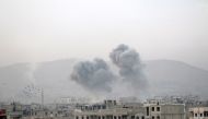 Smoke rises after Assad regime's airstrikes hit the de-escalation zone of Arbin town of the Eastern Ghouta region in Damascus, Syria on November 08, 2017. Diaa Al Din - AA
