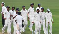 Indian captain Virat Kohli (3R) and teammates walk off the pitch after bad light stopped play on the final day of the first Test between India and Sri Lanka at the Eden Gardens cricket stadium in Kolkata on November 20, 2017. The match ended in a draw. (A