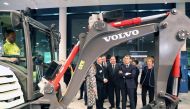 France's President Emmanuel Macron and Sweden's Prime Minister Stefan Lofven speak to employees during a visit to the Volvo Campus Lundby of the Swedish carmaker on the sidelines of the European Social Summit in Gothenburg, Sweden, on November 17, 2017. A