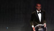 IAAF President Sebastian Coe awards Qatar's Mutaz Essa Barshim the Male Athlete Of The Year award Reuters/Eric Gaillard