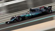 Mercedes' British driver Lewis Hamilton steers his car during the third practice session ahead of the Abu Dhabi Formula One Grand Prix at the Yas Marina circuit on November 25, 2017. / AFP / KARIM SAHIB
