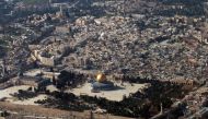 (FILES) This file photo taken on January 11, 2010 shows an aerial view of Jerusalem's Old City, including the Al-Aqsa mosques compound, with the landmark Dome of the Rock mosque in the centre. AFP / AFP FILES / MARINA PASSOS
