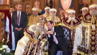 Egyptian Coptic Pope Tawadros II (L), Pope of the Coptic Orthodox Church of Alexandria and Patriarch of Saint Marc Episcopate receives Egyptian President Abdel Fattah al-Sisi (R), at the new Coptic Cathedral at the new Coptic Cathedral 