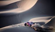 Qatar’s Nasser Al Attiyah of Qatar and Matthieu Baumel of France drive their Toyota during the fifth stage of the 40th Dakar Rally in Arequipa, Peru on Wednesday.
