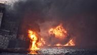 Iranian oil tanker Sanchi is seen engulfed in fire in the East China Sea, in this January 13, 2018, picture provided by Shanghai Maritime Search and Rescue Centre and released by China Daily. China Daily via Reuters