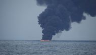 Flames and smoke from the Iranian oil tanker Sanchi is seen in the East China Sea, on January 15, 2018 in this photo provided by Japan's 10th Regional Coast Guard. 10th Regional Coast Guard Headquarters/Handout via REUTERS.