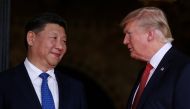 FILE PHOTO: US President Donald Trump welcomes Chinese President Xi Jinping at Mar-a-Lago in Palm Beach, Florida, U.S., April 6, 2017. REUTERS/Carlos Barria/File Photo
