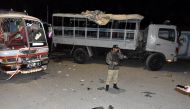 A soldier stands at the scene off a blast targeting a police truck in Quetta, Pakistan January 9, 2018. REUTERS/ Naseer Ahmed
