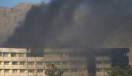 Smoke rises from the Intercontinental Hotel during an attack in Kabul, Afghanistan January 21, 2018. REUTERS/Mohammad Ismail